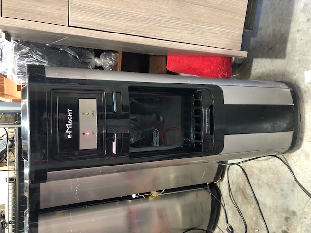 E-Macht Hot and Cold Top Loading Water Despenser. Powers on, Untested for Functionality. $20 (304763)